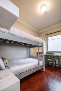 Cama ou camas em um quarto em TARATA BOUTIQUE HOTEL