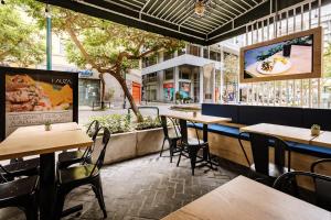 Um restaurante ou outro lugar para comer em TARATA BOUTIQUE HOTEL