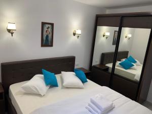 Postel nebo postele na pokoji v ubytování Vila F&C