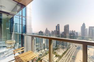 a balcony with a view of a city at Paramount, Midtown - Locations in Dubai