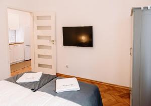 Posteľ alebo postele v izbe v ubytovaní Memory Apartments