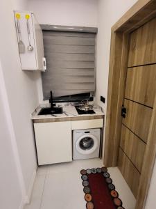 Eldhús eða eldhúskrókur á Ikoyi/Banana Studio Room