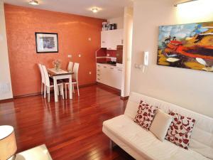 a living room with a couch and a table at Apartment Gaga in Rovinj