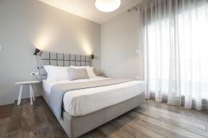 Postel nebo postele na pokoji v ubytování Enalia Villas