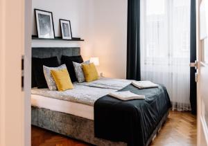 Posteľ alebo postele v izbe v ubytovaní Memory Apartments