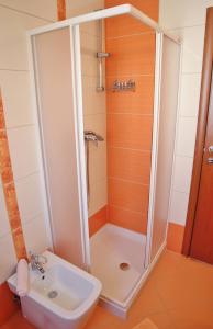 a bathroom with a shower and a sink at Apartment Gaga in Rovinj +19 photos