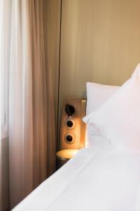 Voodi või voodid majutusasutuse Hotel Aare Thun toas
