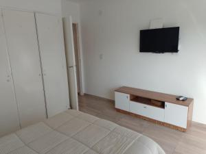 เตียงในห้องที่ Lovely one bedroom apartment in Vicente Lopez