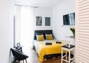 Posteľ alebo postele v izbe v ubytovaní Memory Apartments