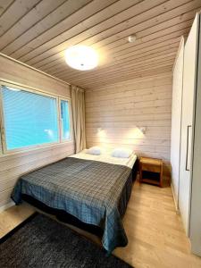 Ένα ή περισσότερα κρεβάτια σε δωμάτιο στο Himos Villa Himalaja +18 φωτογραφίες