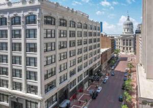 an aerial view of a large white building on a street at Downtown Penthouse Suite with Amazing View in Indianapolis