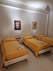 A bed or beds in a room at La Camera sul Corso