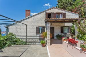 a brick house with plants in front of it at Villa Maria in Dubrovnik