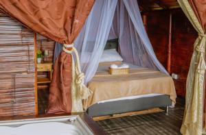 Postel nebo postele na pokoji v ubytování Glamping Mirador Santa Fe-Sopetran