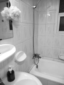 a bathroom with a toilet and a sink and a shower at 05 Burjuman metro stations Unisex Hostel Private room - 05 in Dubai