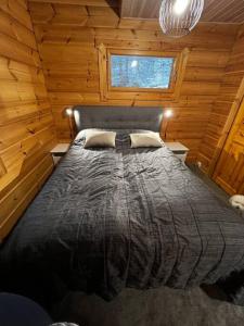Postel nebo postele na pokoji v ubytování Himostuuli
