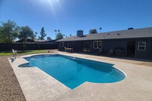 a swimming pool in front of a house at *Msg for 5%off*KingBed PoolYard GuesthouseGlendale in Glendale