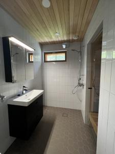 Koupelna v ubytování Himos Alahonka B + 2 fotografie