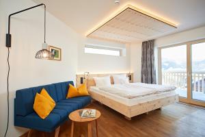 Postel nebo postele na pokoji v ubytování Bio-Hotel Oswalda-Hus