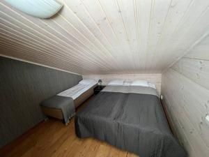 Postel nebo postele na pokoji v ubytování Kuikanhovi B Himos