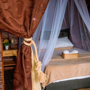 Postel nebo postele na pokoji v ubytování Glamping Mirador Santa Fe-Sopetran