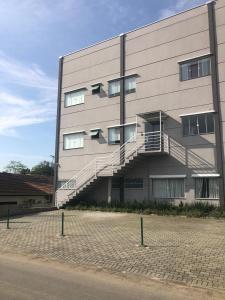 a building with stairs on the side of it at Morada Pomerode in Pomerode