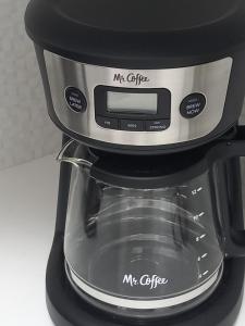 a black and silver coffee maker sitting on a counter at Marchabell by the Sea E22 in Ocho Rios