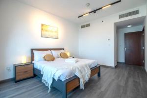 Postel nebo postele na pokoji v ubytování Elite Residence-Dubai Marina with Ain Dubai View