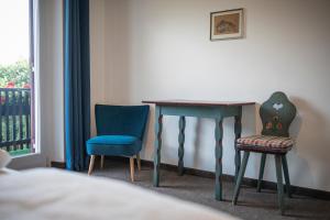 A bed or beds in a room at Villa Ladurner