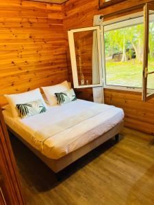 Ένα ή περισσότερα κρεβάτια σε δωμάτιο στο Bungalow TEIPO