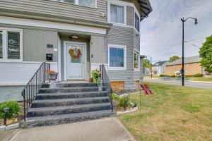 a house with stairs leading to the front door at Convenient Dayton Vacation Rental Near Downtown! in Dayton