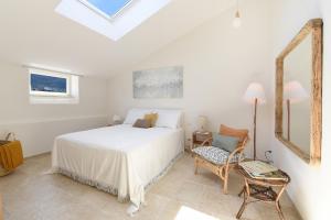 Postel nebo postele na pokoji v ubytování Villa Tozzoli 'Top' Floor