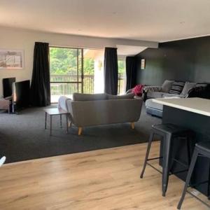 Χώρος καθιστικού στο Paihia Retreat