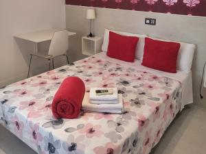 Łóżko lub łóżka w pokoju w obiekcie Hostal Inn Madrid