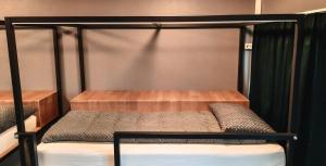 A bed or beds in a room at Bus Hostel Reykjavik - Reykjavik Terminal