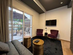 Μια τηλεόραση ή/και κέντρο ψυχαγωγίας στο Beer Garden Hotel