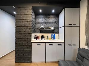 Η κουζίνα ή μικρή κουζίνα στο Beer Garden Hotel