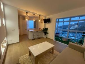 A kitchen or kitchenette at Apartment inside the wave II studio