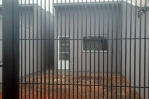 a metal cage with two windows in a building at North Park 388 in Campo Grande