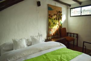 Postel nebo postele na pokoji v ubytování HOTEL CHORRO DE LUZ + 21 fotografií