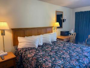 Postel nebo postele na pokoji v ubytování RANGER MOTEL