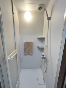 Koupelna v ubytování ホステル今鶴 四人部屋 202号室 + 14 fotografií