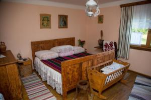 Postel nebo postele na pokoji v ubytování Apartment Eko Etno selo Stara Kapela, Pavina kuća