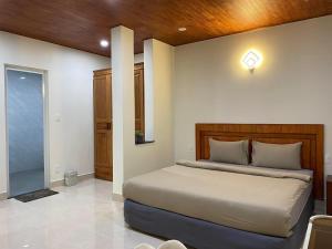 Postel nebo postele na pokoji v ubytování Da Quy Harmony Homestay