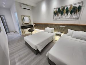 Letto o letti in una camera di One Point Hotel