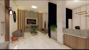 una hall con soggiorno dotato di divani e TV di Hotel 7 Quedas a Guaíra