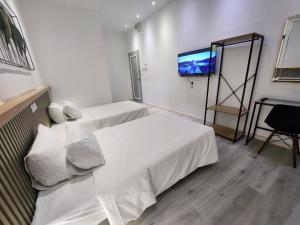Letto o letti in una camera di One Point Hotel