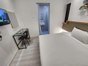 Letto o letti in una camera di One Point Hotel