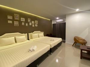 บ้านสวนสมบูรณ์客房内的一张或多张床位