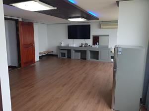 Kuchyň nebo kuchyňský kout v ubytování Mangsang Beach Pension